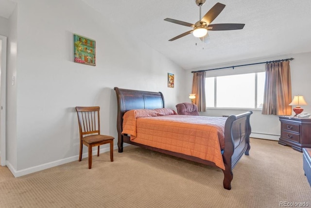 bedroom featuring lofted ceiling, a baseboard radiator, light colored carpet, and ceiling fan