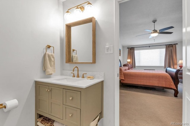 bathroom featuring vanity and ceiling fan