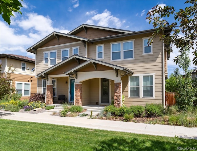 3412 Valentia St, Denver, CO 80238 - craftsman-style home featuring a porch and stone siding