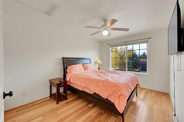 106 Cherry St, Castle Rock, CO 80104 - bedroom featuring wood finished floors, attic access, and a ceiling fan