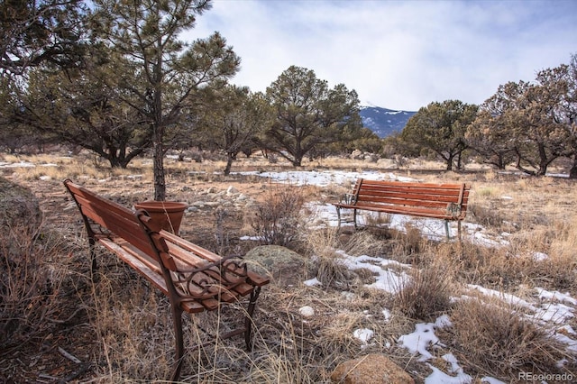 surrounding community with a mountain view