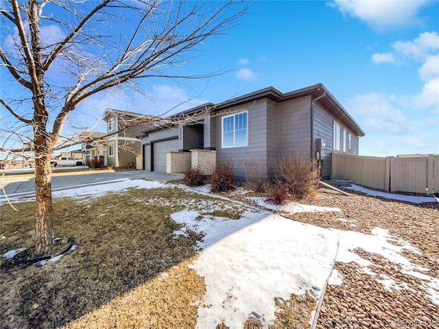 view of front of property featuring a garage