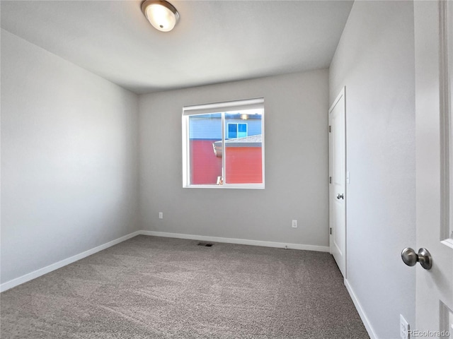 view of carpeted spare room