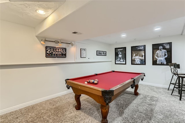 rec room featuring carpet flooring, visible vents, and baseboards