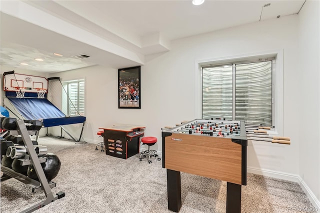 playroom with carpet flooring, visible vents, and baseboards