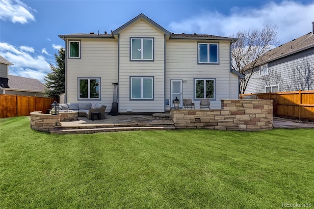 back of house featuring a patio, a yard, a fenced backyard, and an outdoor living space