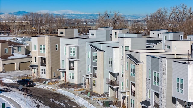 view of building exterior featuring a mountain view