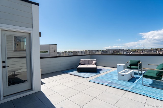 view of patio with an outdoor fire pit