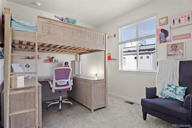 carpeted bedroom with baseboards, multiple windows, and visible vents