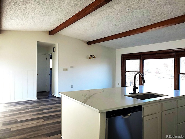 609 S 1st Ave, Brighton, CO 80601 - kitchen with stainless steel dishwasher, a sink, dark wood-type flooring, light countertops, and a textured ceiling