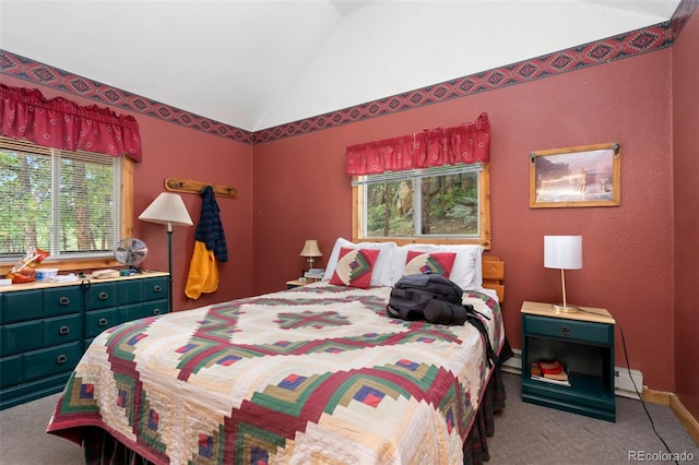 bedroom featuring light carpet, multiple windows, a baseboard radiator, and vaulted ceiling