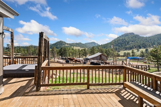 wooden terrace with a mountain view