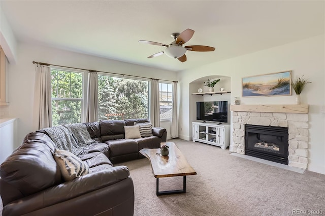 3525 Rinn Valley Dr, Longmont, CO 80504 - living room with a ceiling fan, a fireplace, and carpet