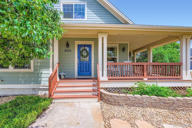 3525 Rinn Valley Dr, Longmont, CO 80504 - entrance to property with a porch