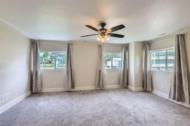 3525 Rinn Valley Dr, Longmont, CO 80504 - carpeted empty room with a textured ceiling and a ceiling fan