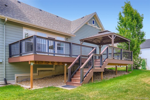 3525 Rinn Valley Dr, Longmont, CO 80504 - rear view of house featuring roof with shingles, a gazebo, a deck, a lawn, and stairs