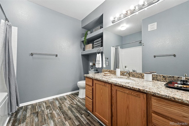 474 Black Feather Loop Unit 406, Castle Rock, CO 80104 - full bath featuring vanity, wood finished floors, and shower / tub combo with curtain