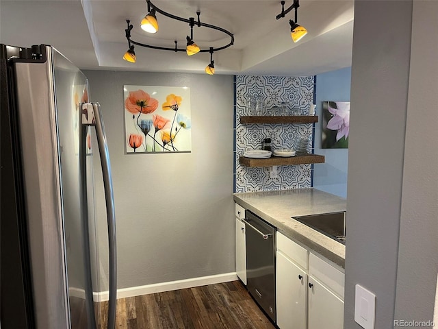 kitchen featuring dark wood-style flooring, open shelves, stainless steel appliances, light countertops, and white cabinetry