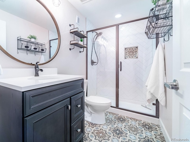3472 Harvard Pl, Broomfield, CO 80023 - bathroom with vanity, toilet, a shower stall, and recessed lighting