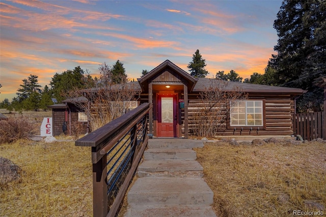 view of log cabin