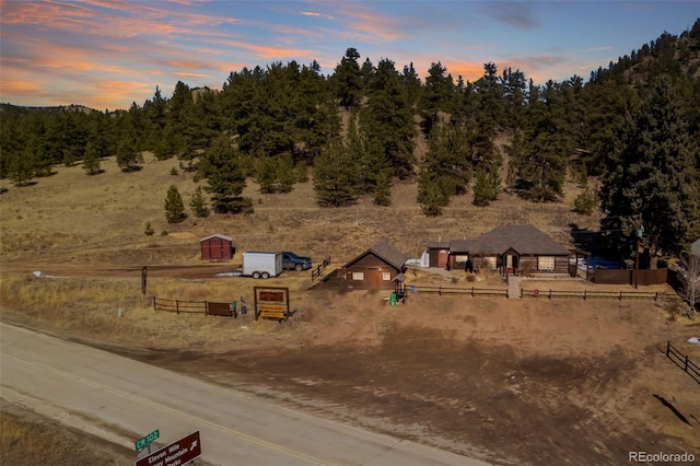 aerial view at dusk with a rural view