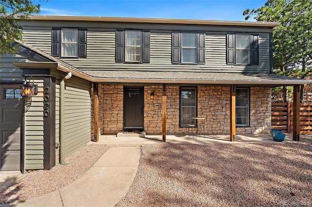 2020 Forest Ridge Dr, Colorado Springs, CO 80918 - view of front of property with a porch and stone siding