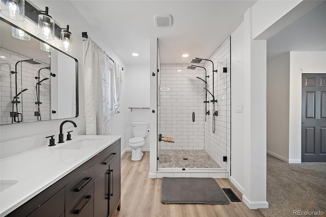 2020 Forest Ridge Dr, Colorado Springs, CO 80918 - full bath featuring a shower stall, baseboards, a sink, and toilet