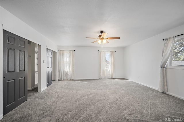 2020 Forest Ridge Dr, Colorado Springs, CO 80918 - interior space featuring baseboards, ceiling fan, and carpet