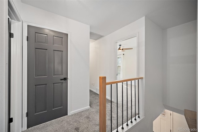 2020 Forest Ridge Dr, Colorado Springs, CO 80918 - corridor featuring an upstairs landing, baseboards, and carpet floors