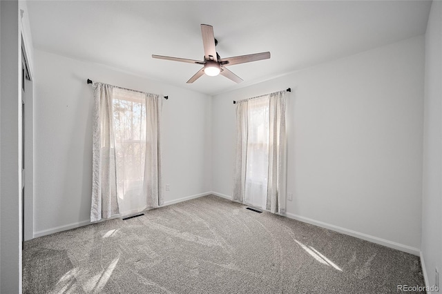 2020 Forest Ridge Dr, Colorado Springs, CO 80918 - carpeted empty room with a healthy amount of sunlight, ceiling fan, and baseboards