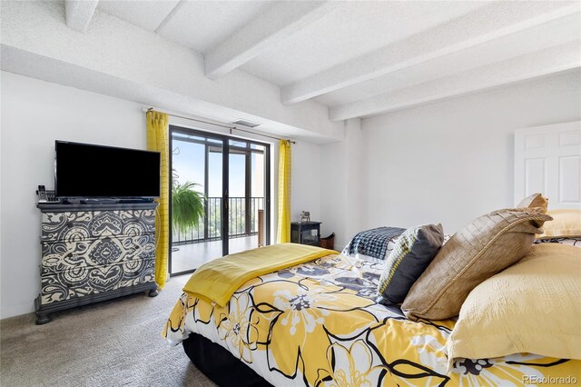 carpeted bedroom featuring beam ceiling, access to exterior, and a textured ceiling