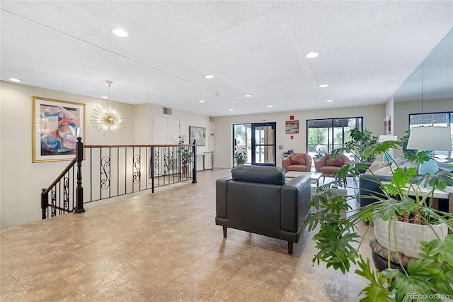 living room featuring a textured ceiling