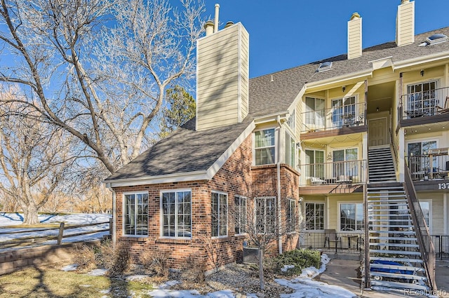 view of snow covered house