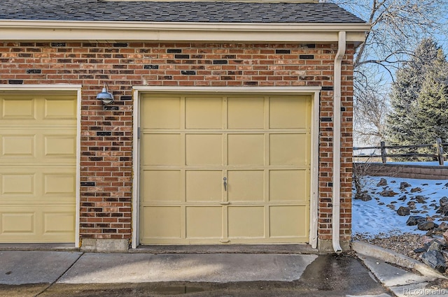 view of snow covered garage