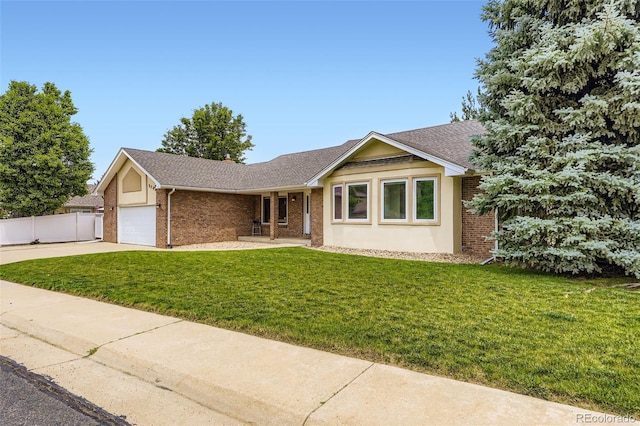 3743 W 103rd Dr, Westminster, CO 80031 - single story home with brick siding, driveway, roof with shingles, and an attached garage
