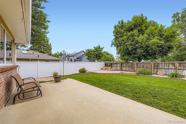 3743 W 103rd Dr, Westminster, CO 80031 - fenced backyard featuring a patio