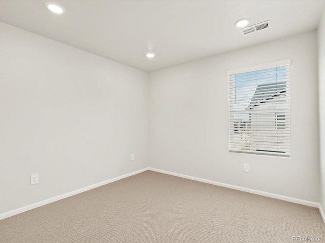755 N Tibet St, Aurora, CO 80018 - carpeted spare room featuring baseboards and recessed lighting