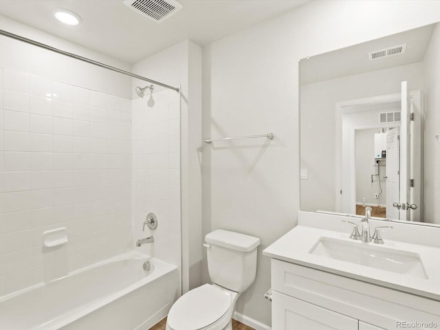 755 N Tibet St, Aurora, CO 80018 - full bathroom with toilet, vanity, shower / bath combination, and recessed lighting