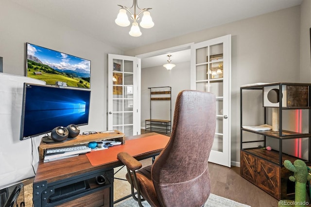 7268 Greenwater Cir, Castle Rock, CO 80108 - office featuring french doors, wood finished floors, and a notable chandelier