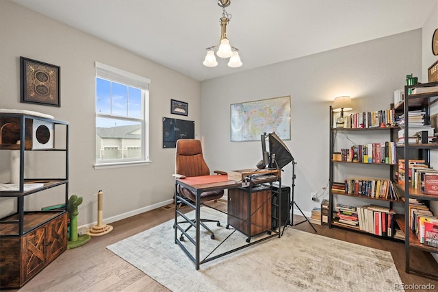 7268 Greenwater Cir, Castle Rock, CO 80108 - office area with baseboards and wood finished floors