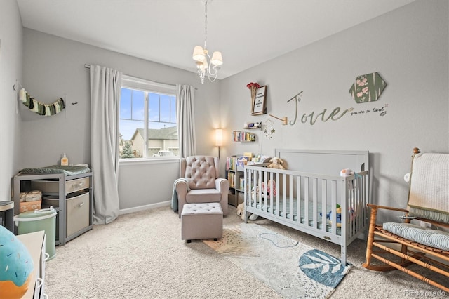 7268 Greenwater Cir, Castle Rock, CO 80108 - carpeted bedroom featuring a crib, baseboards, and a chandelier