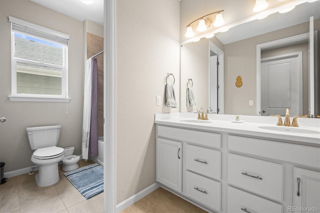 7268 Greenwater Cir, Castle Rock, CO 80108 - bathroom featuring tile patterned floors, a sink, toilet, and double vanity