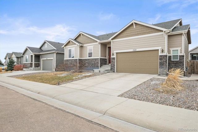 7268 Greenwater Cir, Castle Rock, CO 80108 - craftsman inspired home featuring a garage, driveway, and stone siding