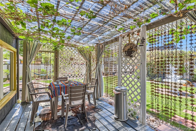 wooden deck with outdoor dining area