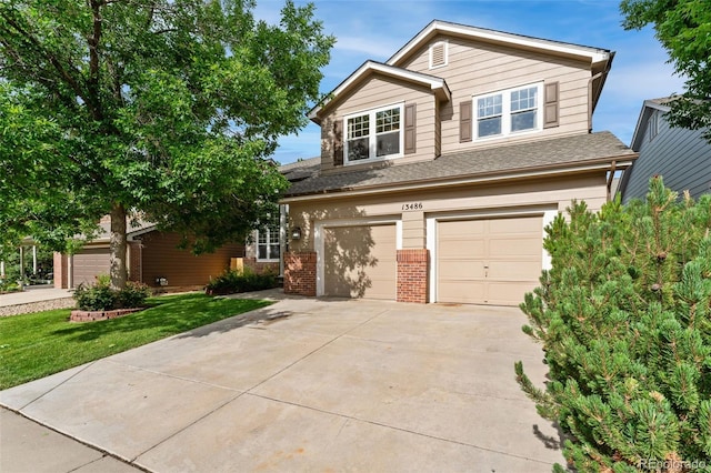 13486 Clayton St, Thornton, CO 80241 - view of front facade featuring brick siding, an attached garage, driveway, a shingled roof, and a front yard