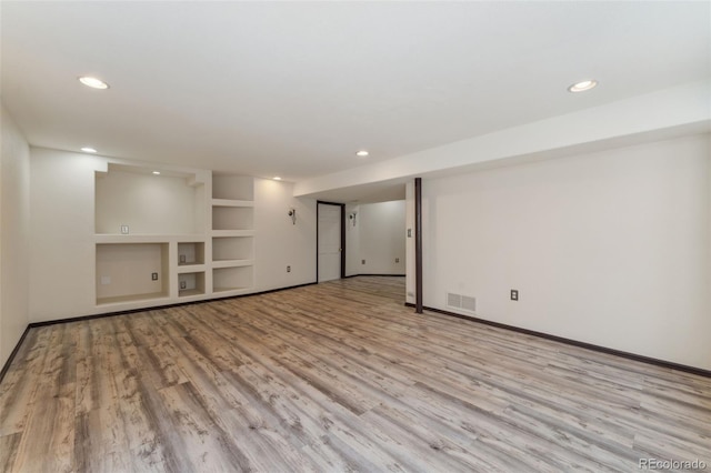 13486 Clayton St, Thornton, CO 80241 - empty room featuring light wood-style flooring, recessed lighting, and built in features