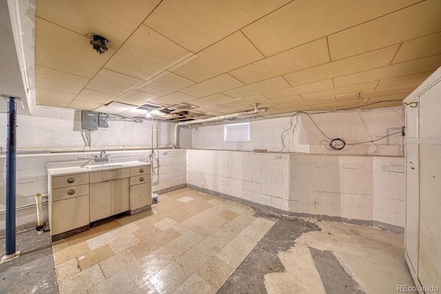 2226 N Greenwood St, Pueblo, CO 81003 - below grade area with a sink and light flooring