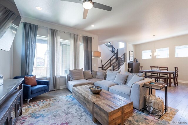 21574 E 59th Dr, Aurora, CO 80019 - living room with ceiling fan, wood finished floors, stairs, recessed lighting, and baseboards