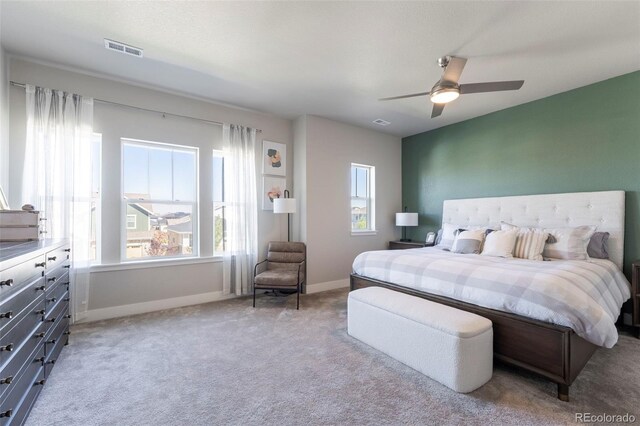 21574 E 59th Dr, Aurora, CO 80019 - carpeted bedroom featuring baseboards and ceiling fan