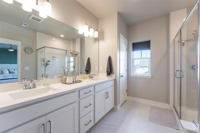 21574 E 59th Dr, Aurora, CO 80019 - bathroom featuring a stall shower, marble look tile flooring, double vanity, and connected bathroom